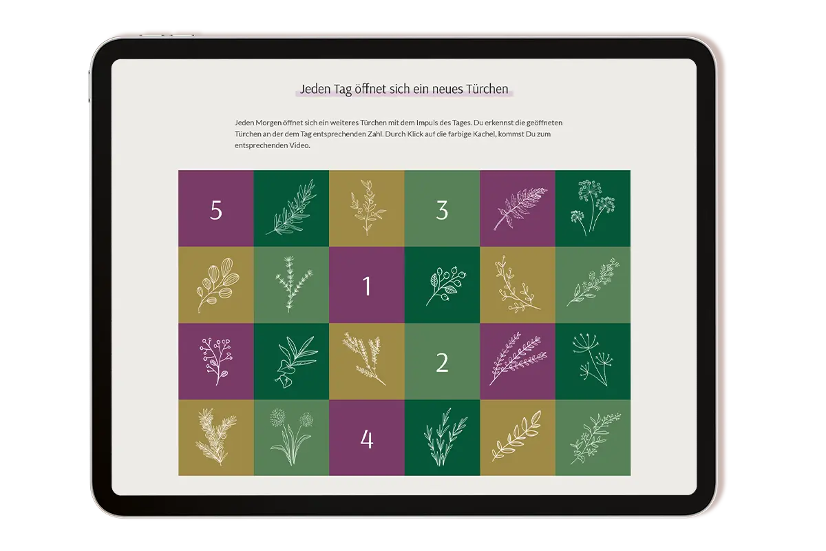 Ein iPad mit den verschiedenen Türchen vom Märchen Adventskalender.